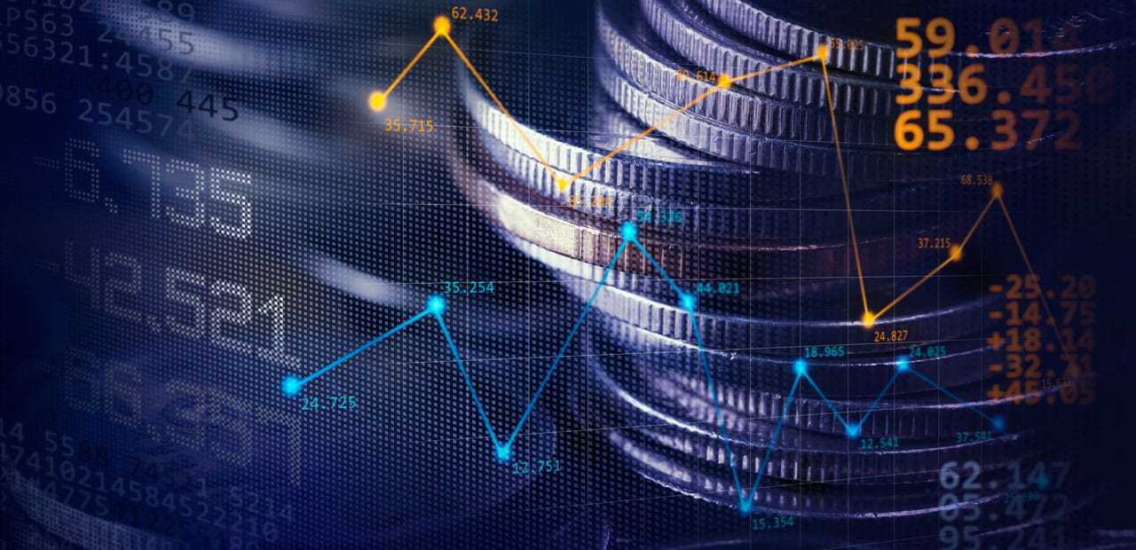An abstract image showing a stack of coins, numbers and graphs.